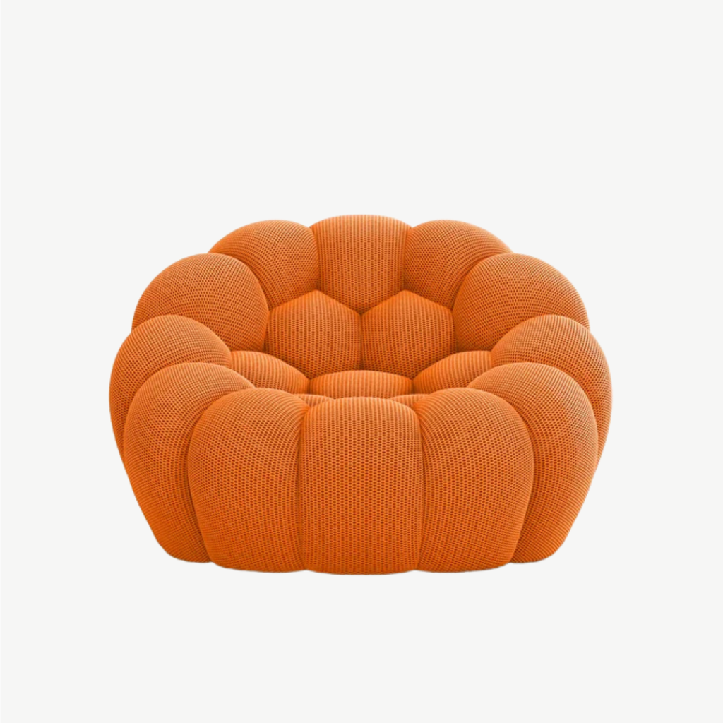 BULÉA Mini round armchair in Tangerine – studio view