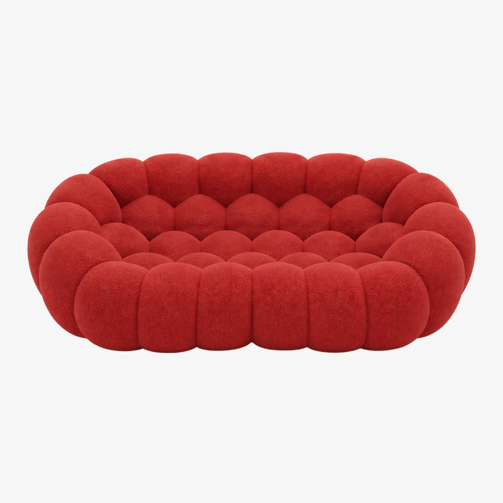 BULÉA 2-seater round sofa in Coral – studio view